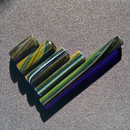 Handblown glass slurper pillars in multiple sizes with space-themed galaxy design